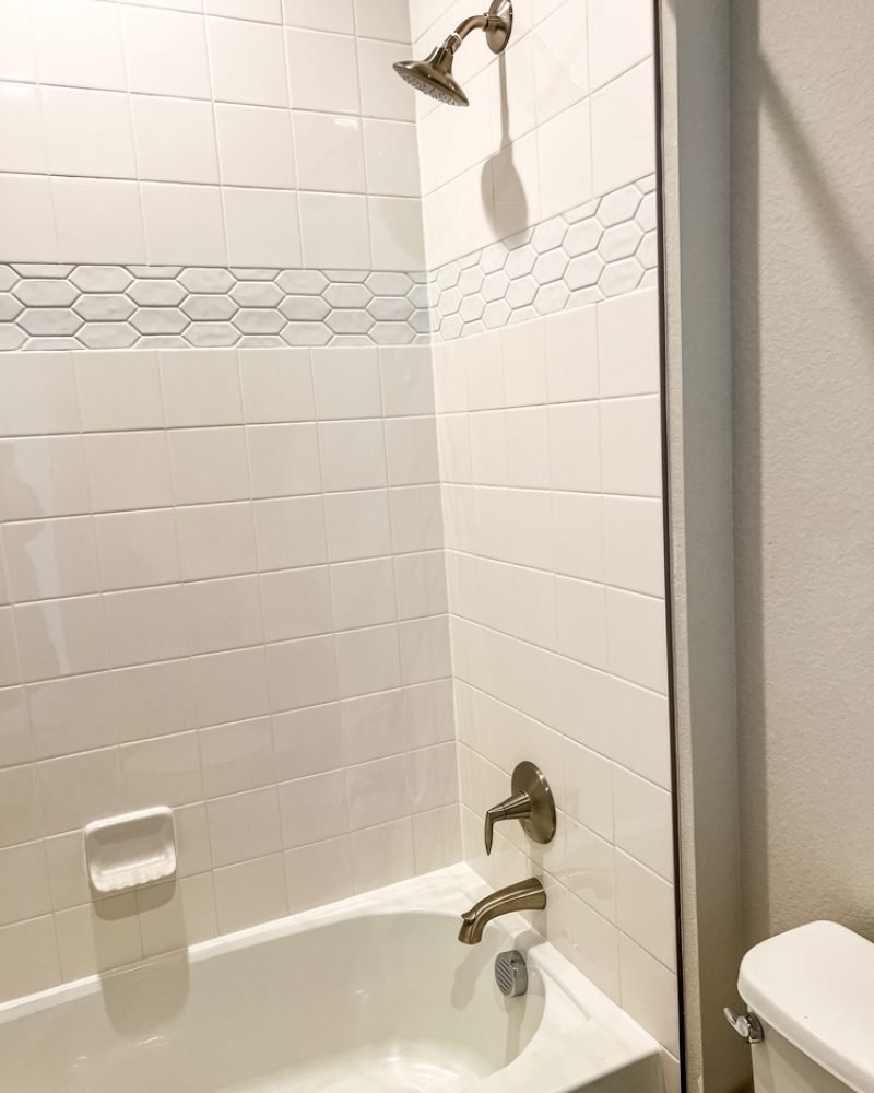 Newly,Installed,Bathroom,Shower,In,A,Modern,Home,Featuring,White